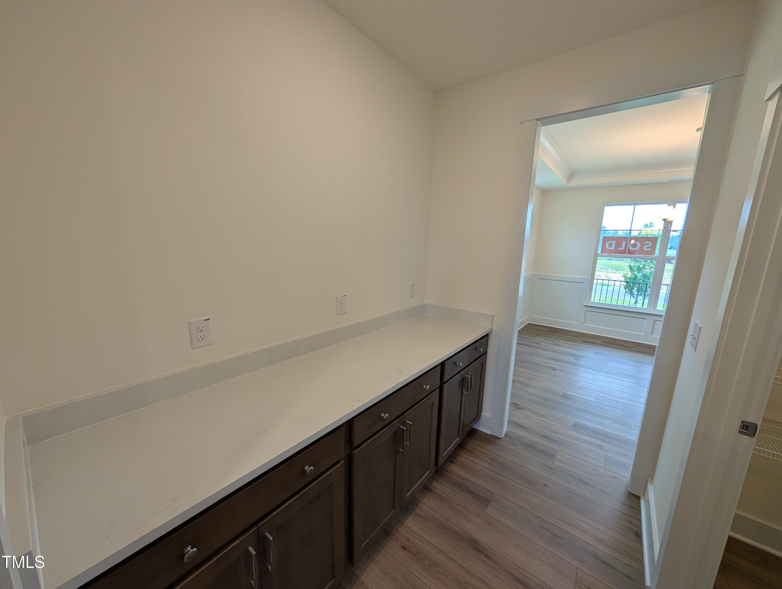 266 Weddington Way Benson, NC 27504 - Photo 11 of 35 a kitchen with wooden floor