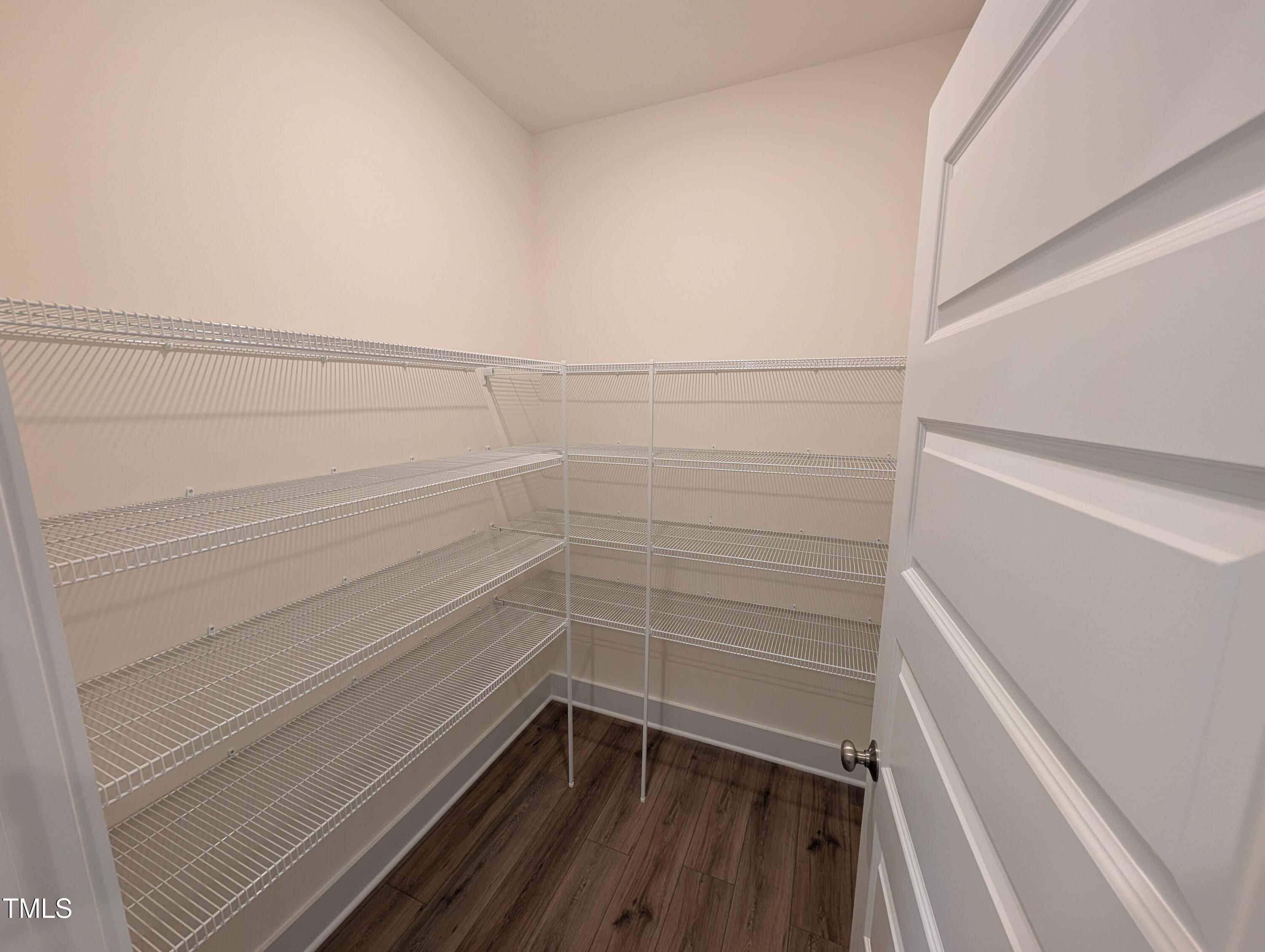 266 Weddington Way Benson, NC 27504 - Photo 12 of 35 a view of walk in closet