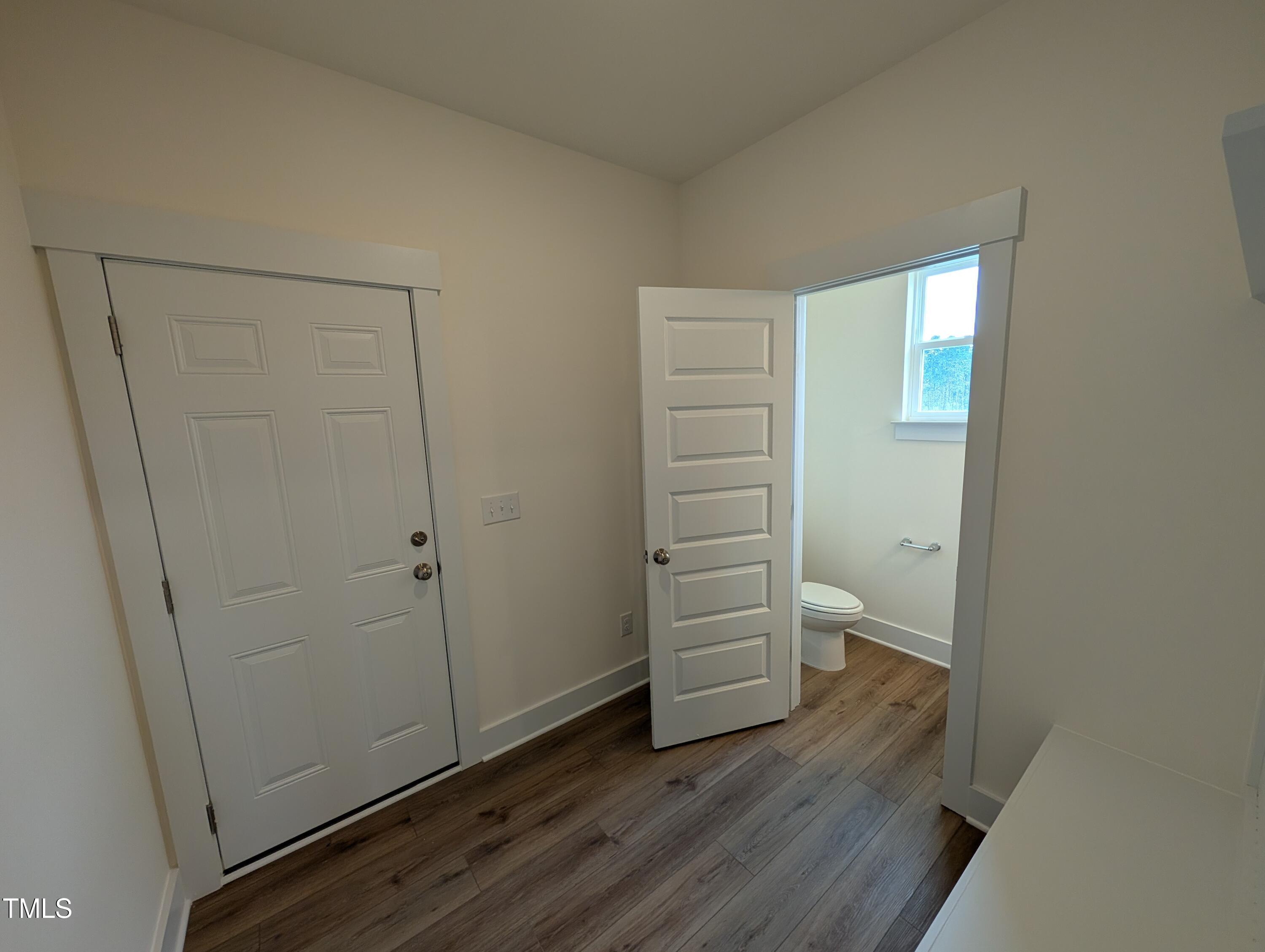 266 Weddington Way Benson, NC 27504 - Photo 15 of 35 wooden floor in an empty room