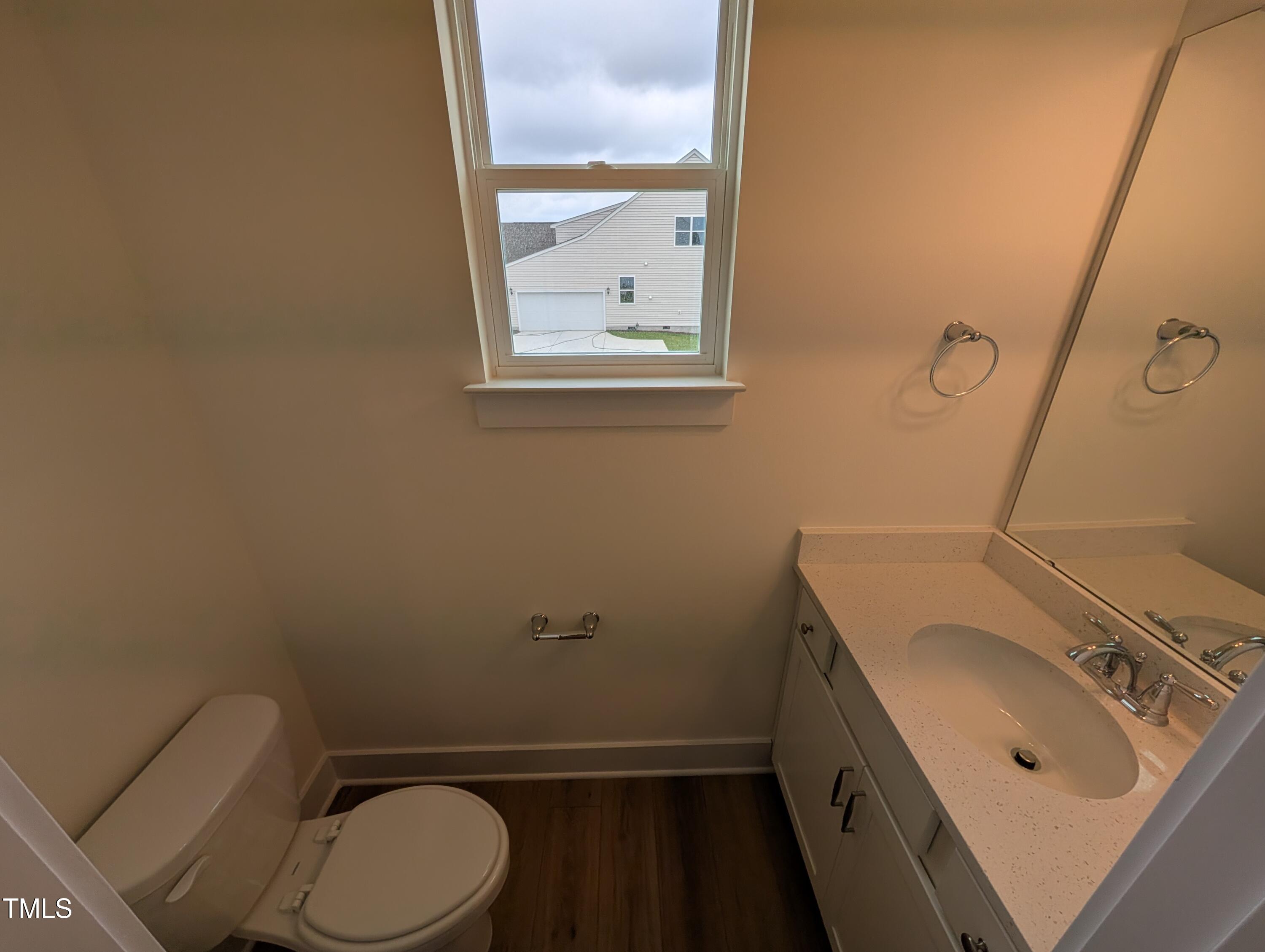 266 Weddington Way Benson, NC 27504 - Photo 16 of 35 a bathroom with a sink and a toilet