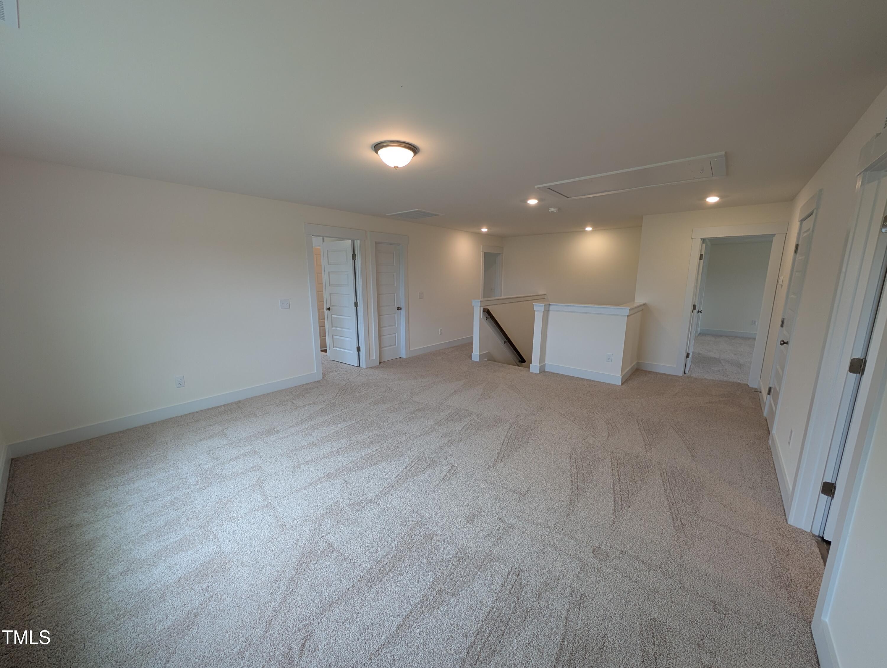 266 Weddington Way Benson, NC 27504 - Photo 18 of 35 a view of a hall with wooden floor