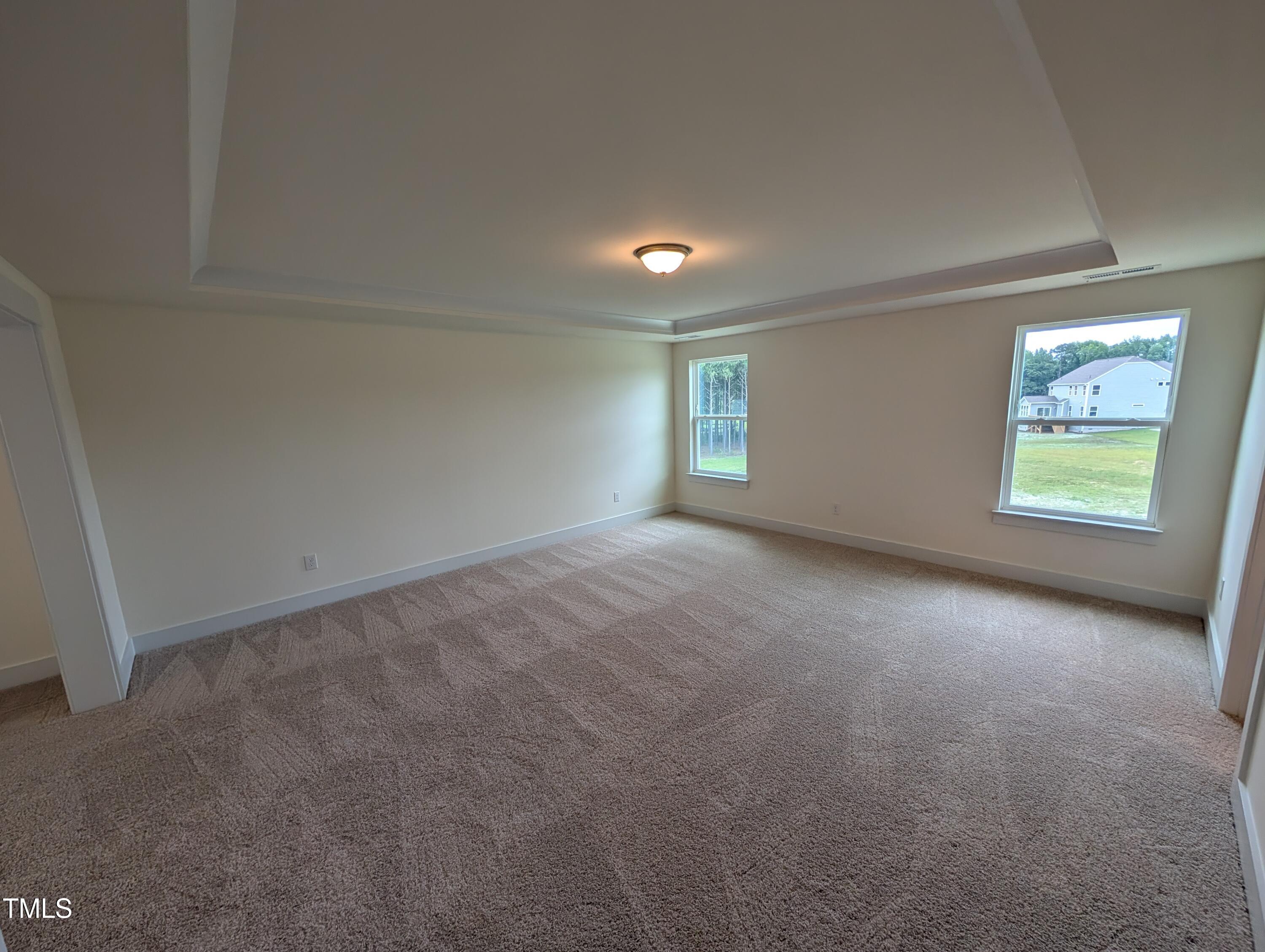 266 Weddington Way Benson, NC 27504 - Photo 25 of 35 an empty room with windows