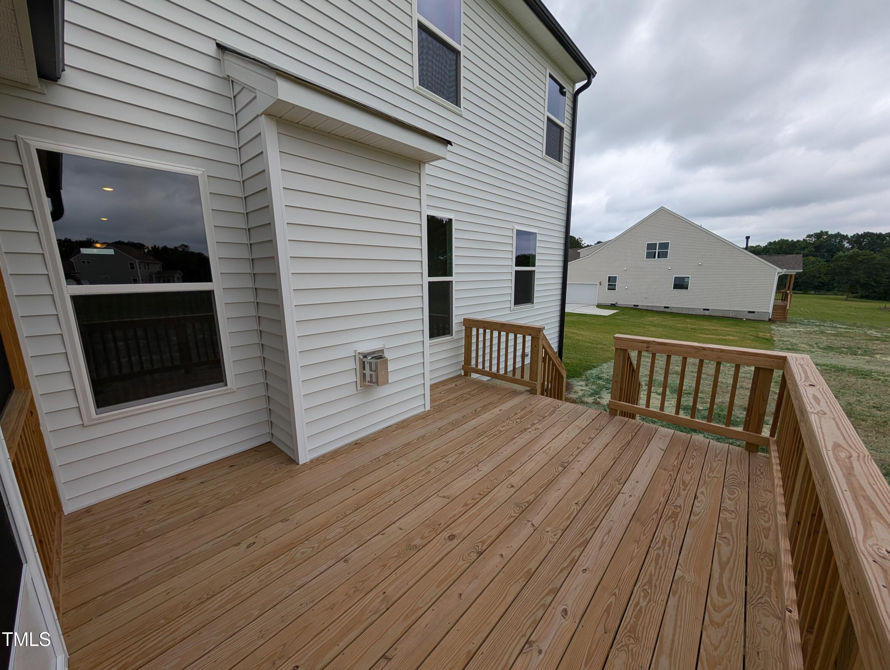 266 Weddington Way Benson, NC 27504 - Photo 33 of 35 a view of balcony with wooden floor