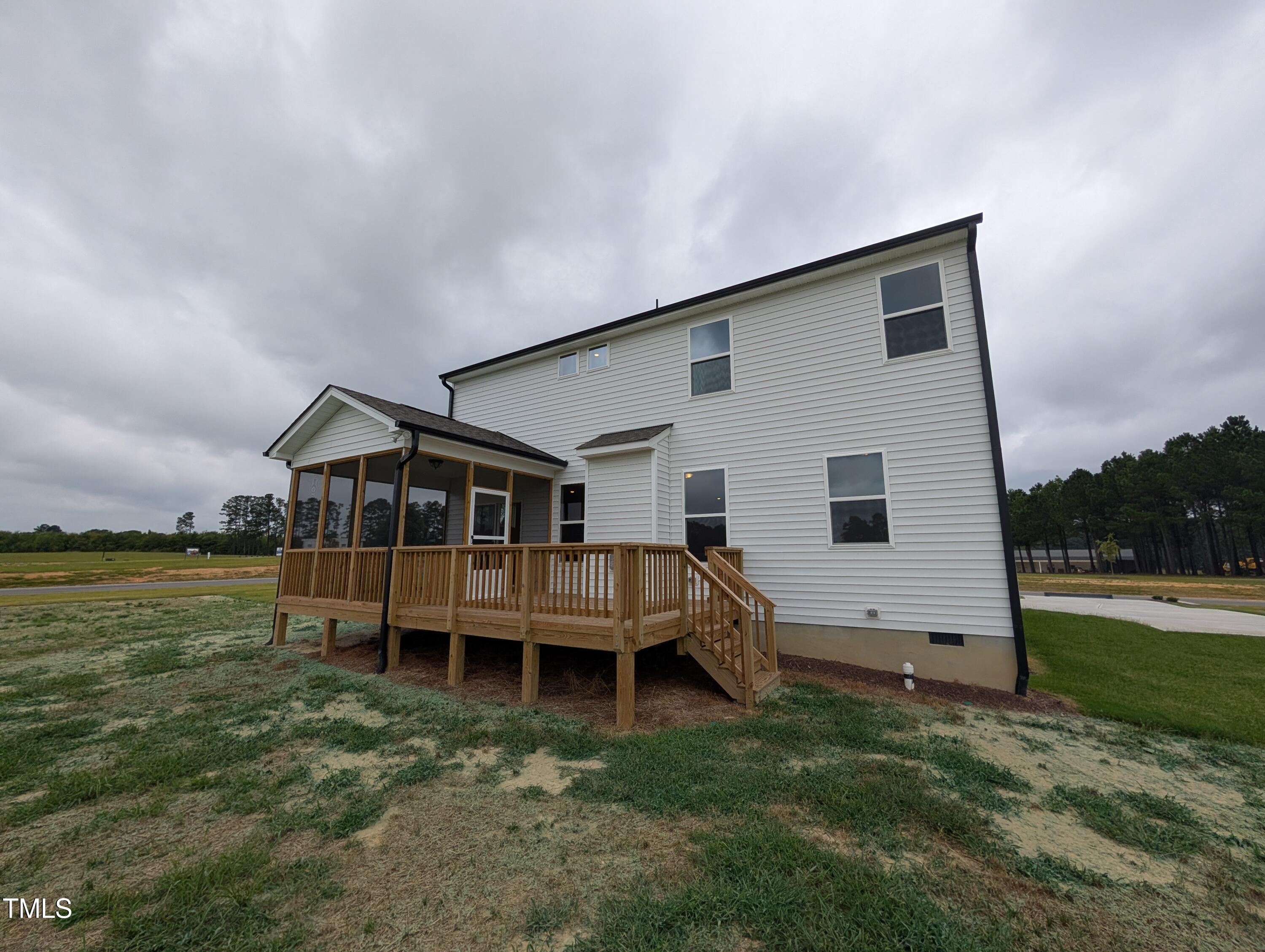 266 Weddington Way Benson, NC 27504 - Photo 34 of 35 a house view with a garden space