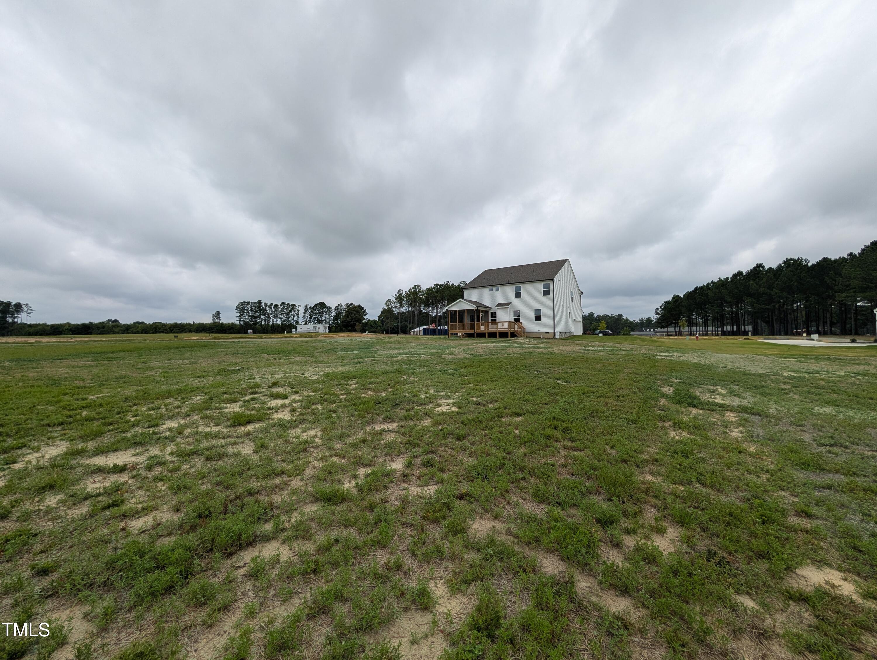 266 Weddington Way Benson, NC 27504 - Photo 35 of 35 a view of a field with an ocean