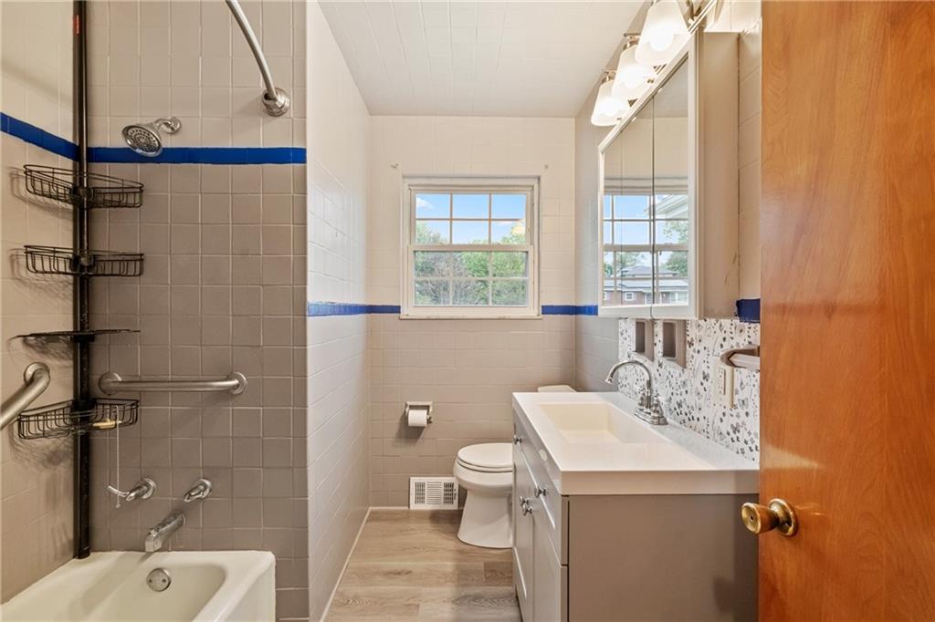 124 Clover Drive Monaca, PA 15061 - Photo 13 of 27 a bathroom with a sink toilet and shower