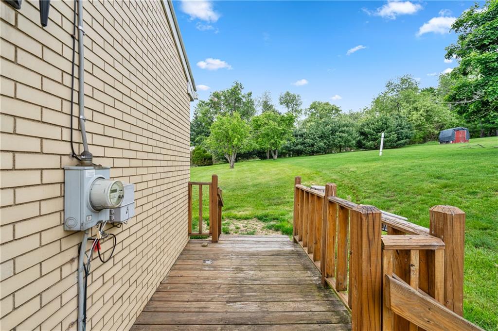124 Clover Drive Monaca, PA 15061 - Photo 25 of 27 a view of a deck with a garden
