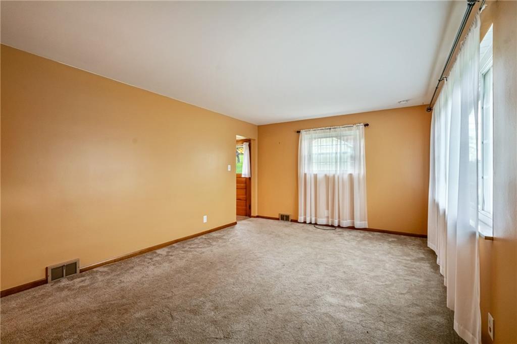 124 Clover Drive Monaca, PA 15061 - Photo 4 of 27 an empty room with windows