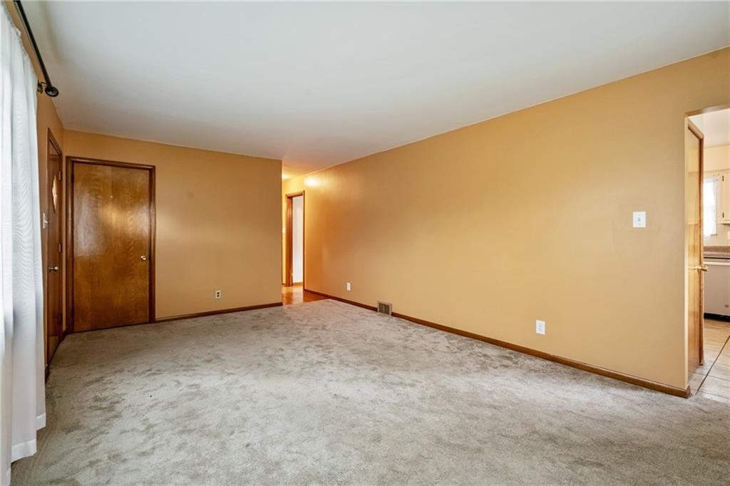 124 Clover Drive Monaca, PA 15061 - Photo 6 of 27 an empty room with a door