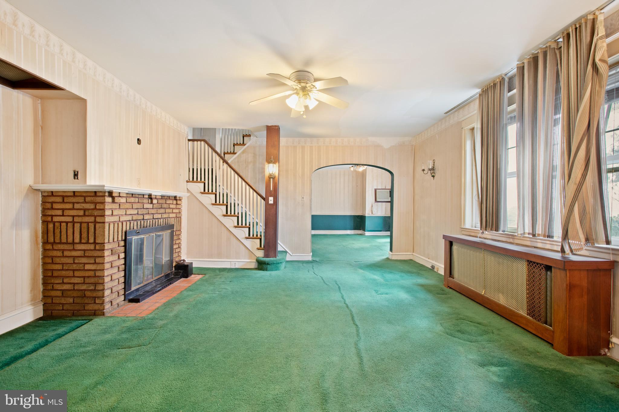 5441 Rising Sun Avenue Philadelphia, PA 19120 - Photo 3 of 17 Living Room / Fireplace