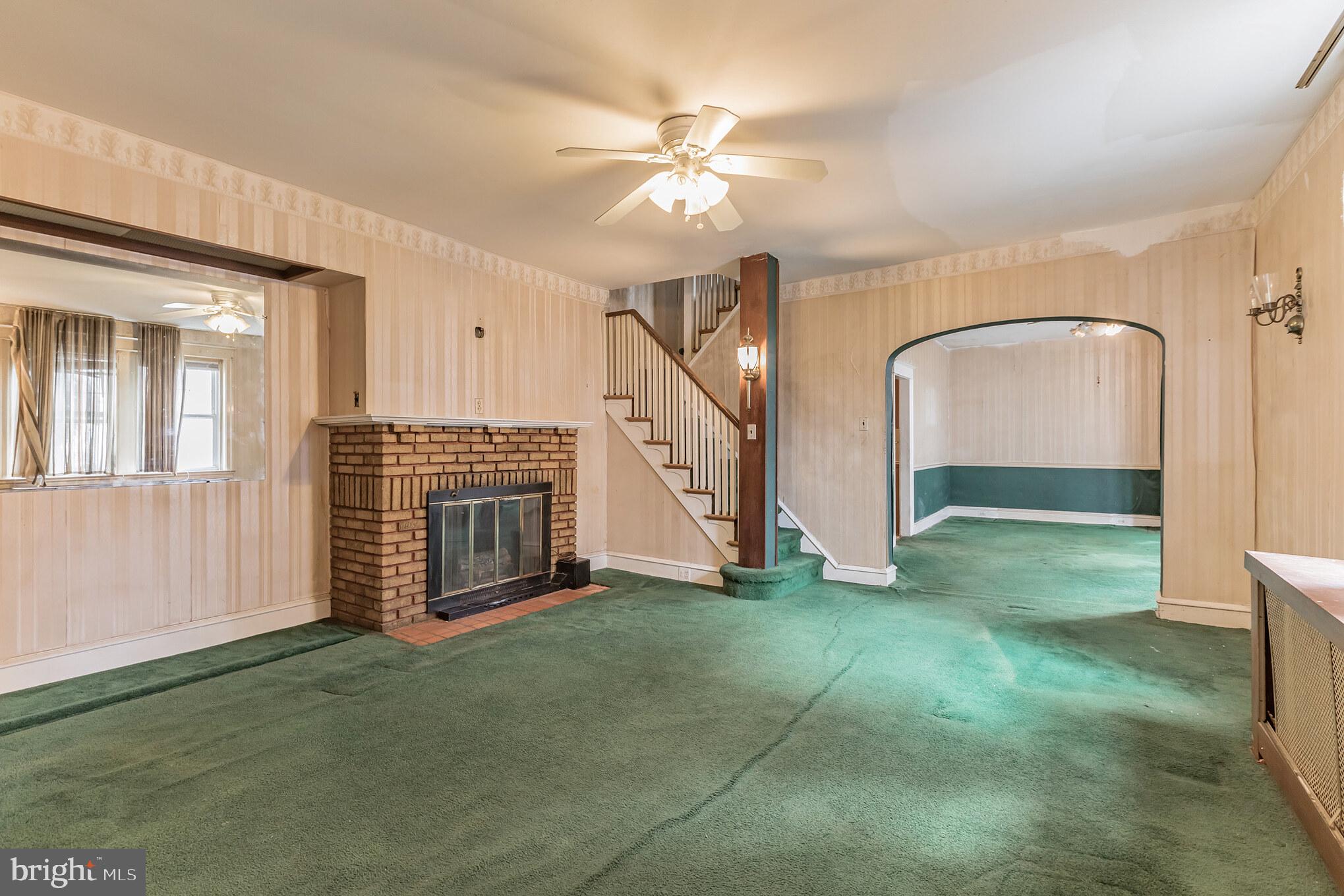 5441 Rising Sun Avenue Philadelphia, PA 19120 - Photo 5 of 17 Living Room / Fireplace 2