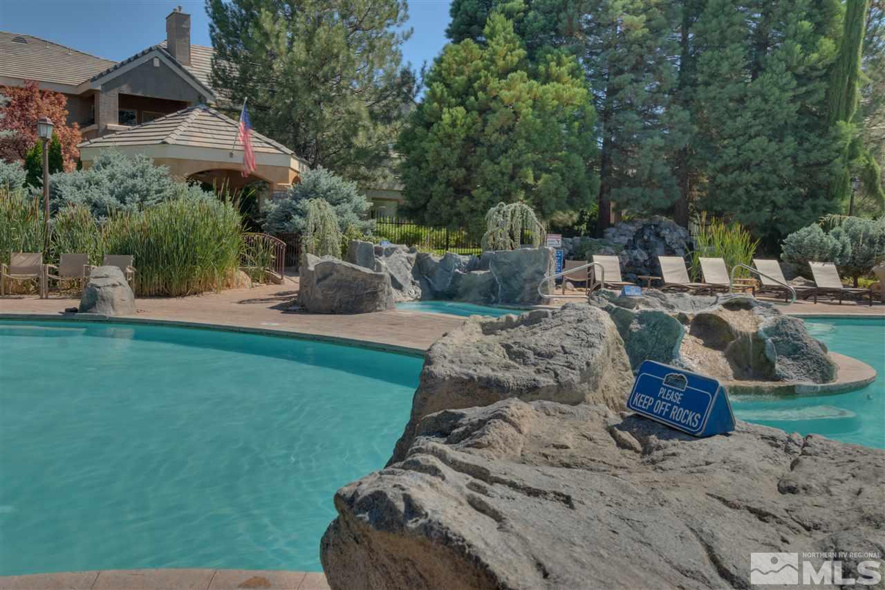 900 South, Unit 3113 Reno, NV 89521 - Photo 15 of 15 a view of a garden with plants and a bench
