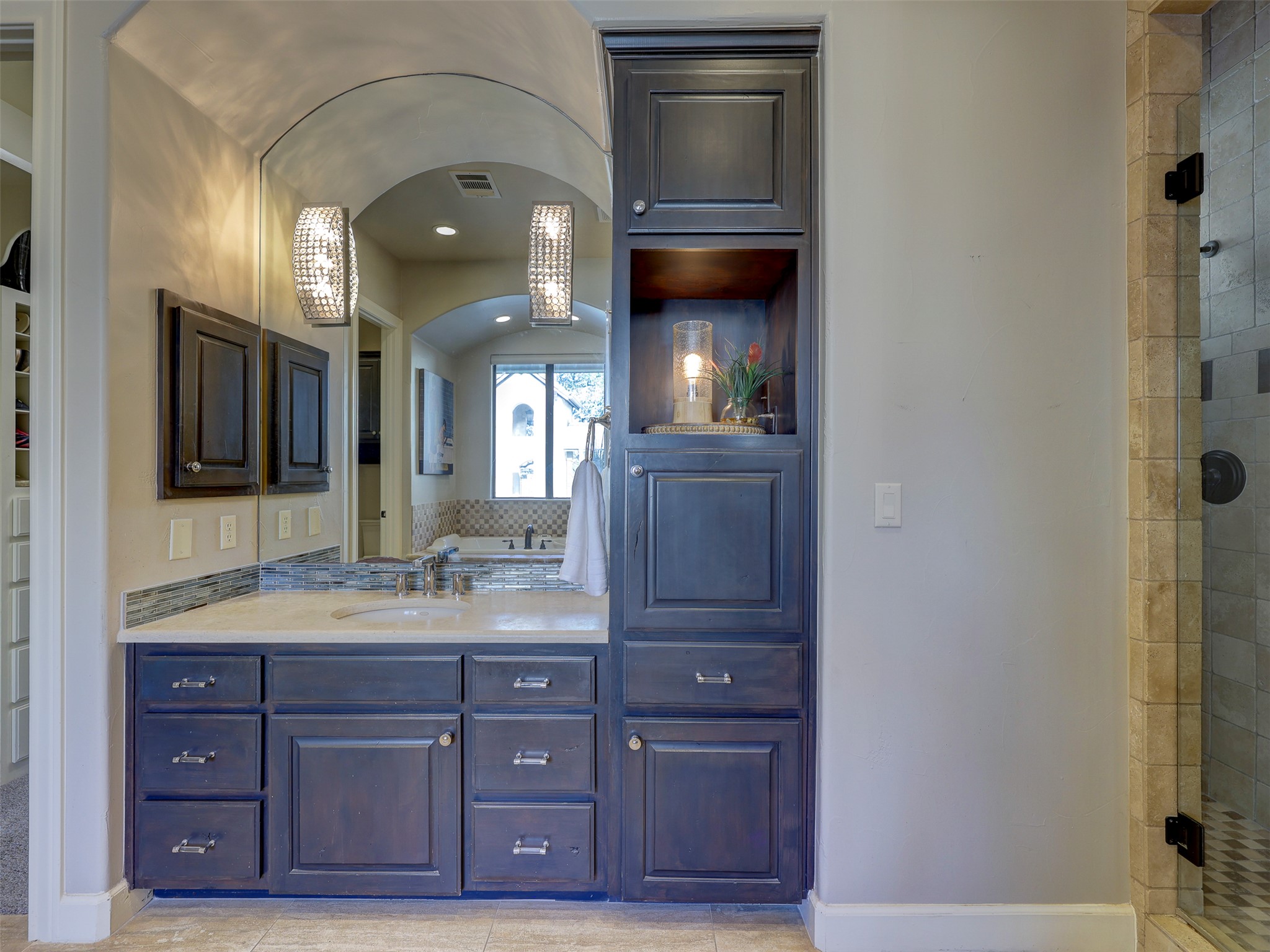 11805 Pleasant Panorama View Austin, TX 78738 - Photo 21 of 40 The tower storage provides ample space for personal essentials while maintaining a clean, curated aesthetic.