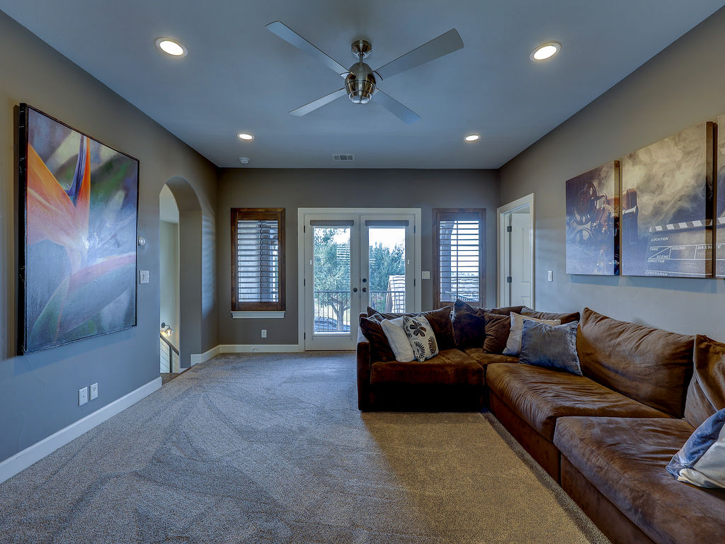 11805 Pleasant Panorama View Austin, TX 78738 - Photo 29 of 40 Just off the bonus room, these doors will lead you to a private balcony with extraordinary Hill Country Views.