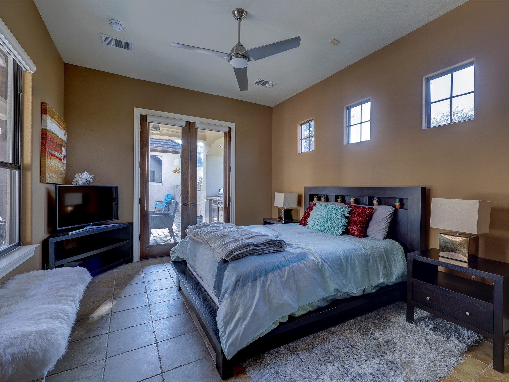 11805 Pleasant Panorama View Austin, TX 78738 - Photo 32 of 40 This ultra private guest casita offers a premier retreat for visitors or multi-generational living, defined by a seamless indoor-outdoor flow through massive French doors that open directly onto a sun drenched patio.