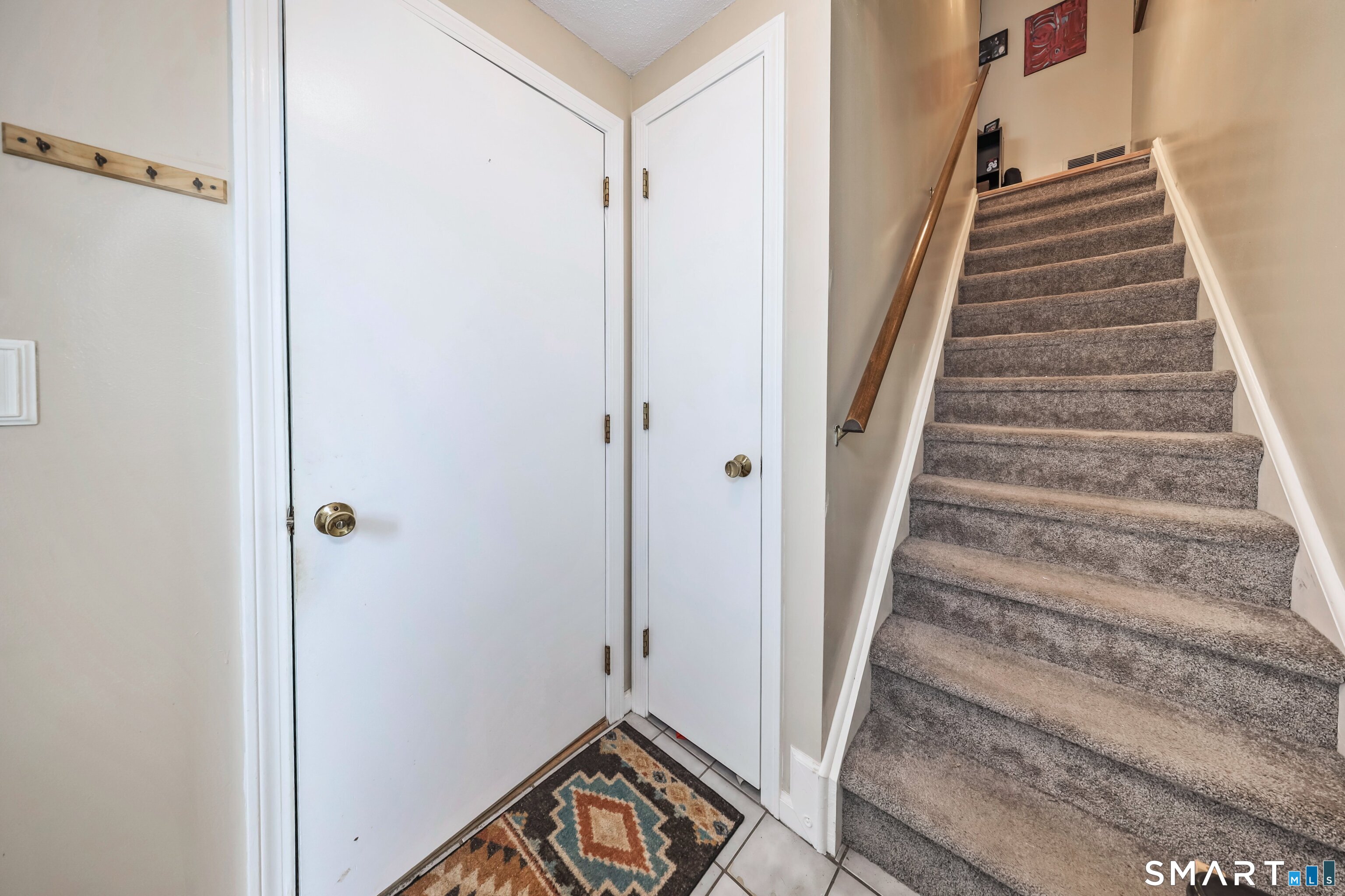 349 Allen Road, Unit 34C Torrington, CT 06790 - Photo 3 of 31 a view of a hallway with staircase