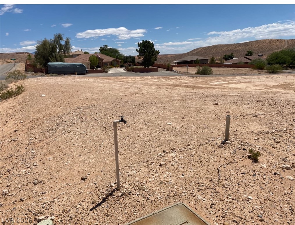 3175 Lou Street Logandale, NV 89021 - Photo 3 of 4 This spacious desert lot offers expansive views and ample room for future development.