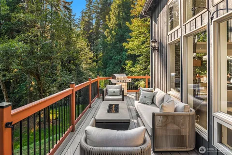 a view of balcony with furniture