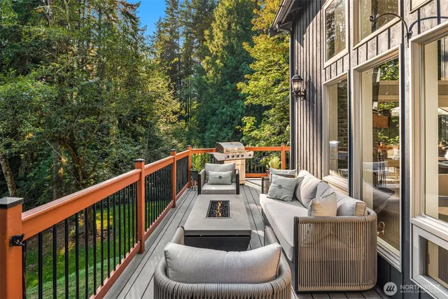 a view of balcony with furniture