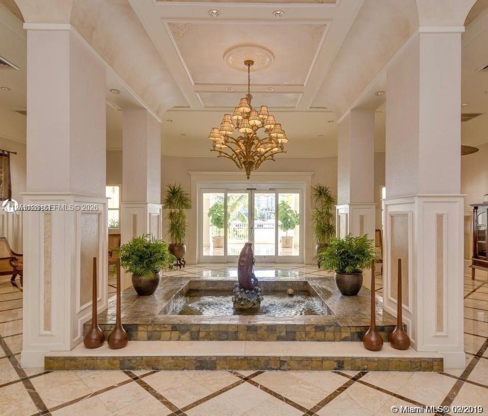 701 Brickell Key Boulevard, Unit 2004 Miami, FL 33131 - Photo 14 of 17 a view of a lobby with furniture