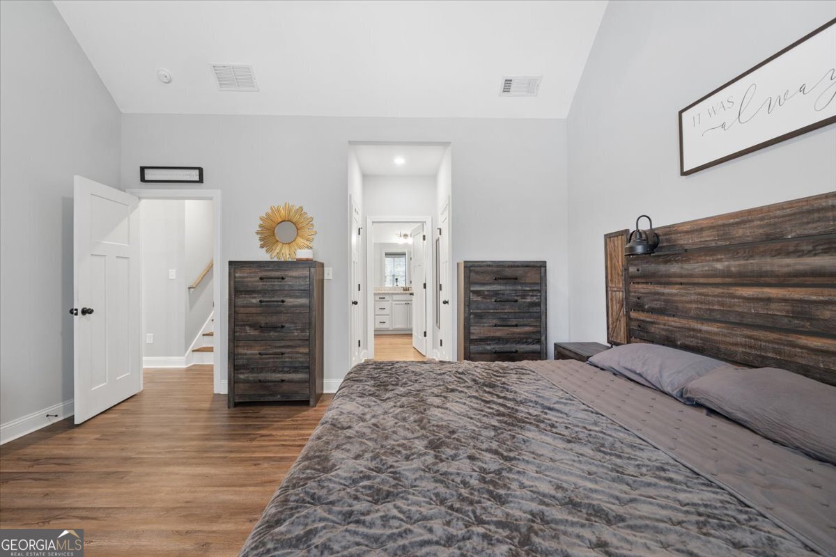 683 Teagle Road Forsyth, GA 31029 - Photo 25 of 50 a view of a bedroom with closet and cabinet