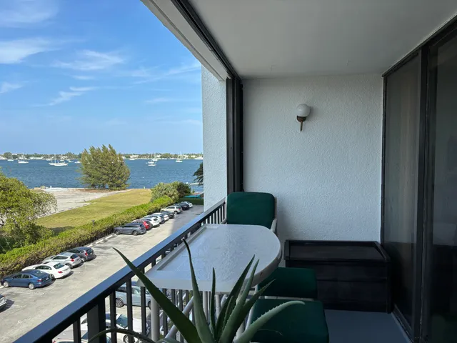 a view of a lake with a yard