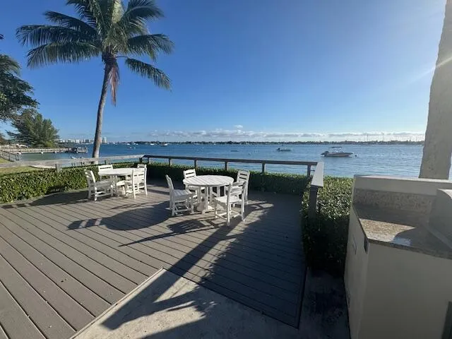 a view of a park with iron fence