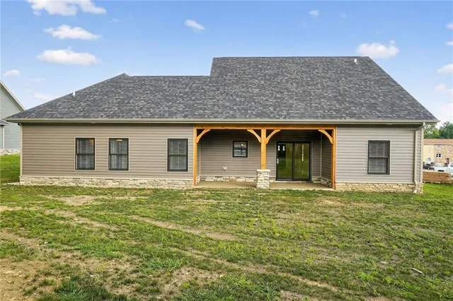 a house view with a garden space