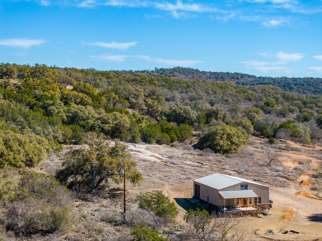 1101 Crider Road Marble Falls, TX 78654 - Photo 1 of 26 a view of a city with mountains in the background