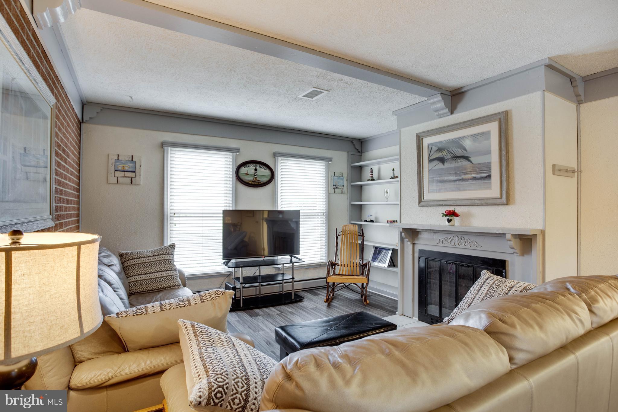 11633 Rivershore Drive Dunkirk, MD 20754 - Photo 16 of 29 a living room with furniture and a flat screen tv