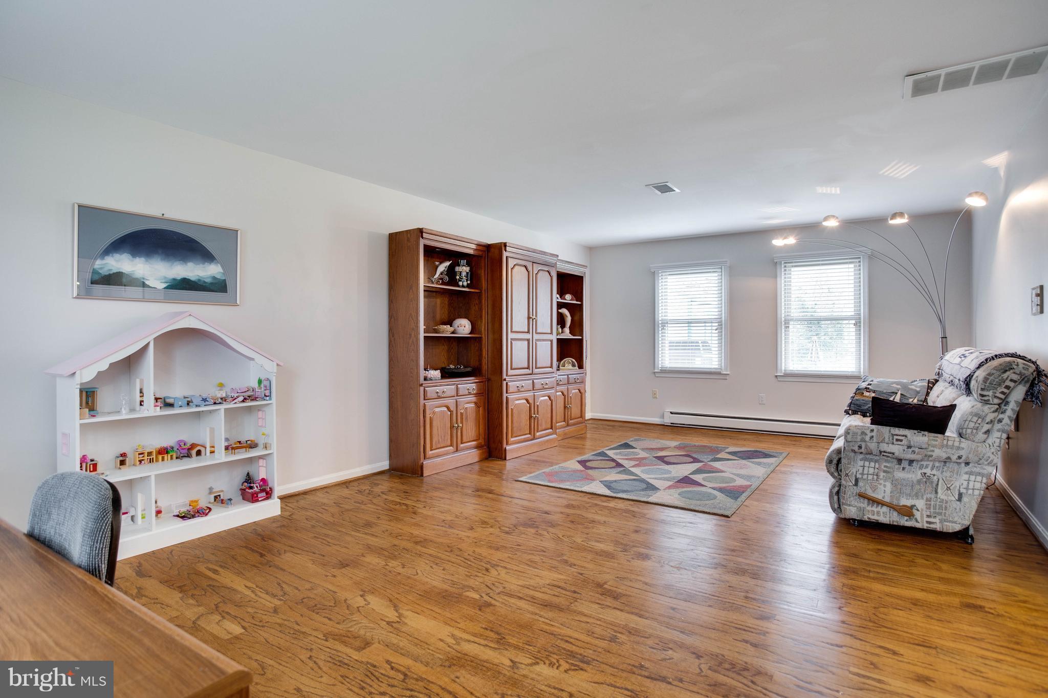 11633 Rivershore Drive Dunkirk, MD 20754 - Photo 18 of 29 a bedroom with furniture and window