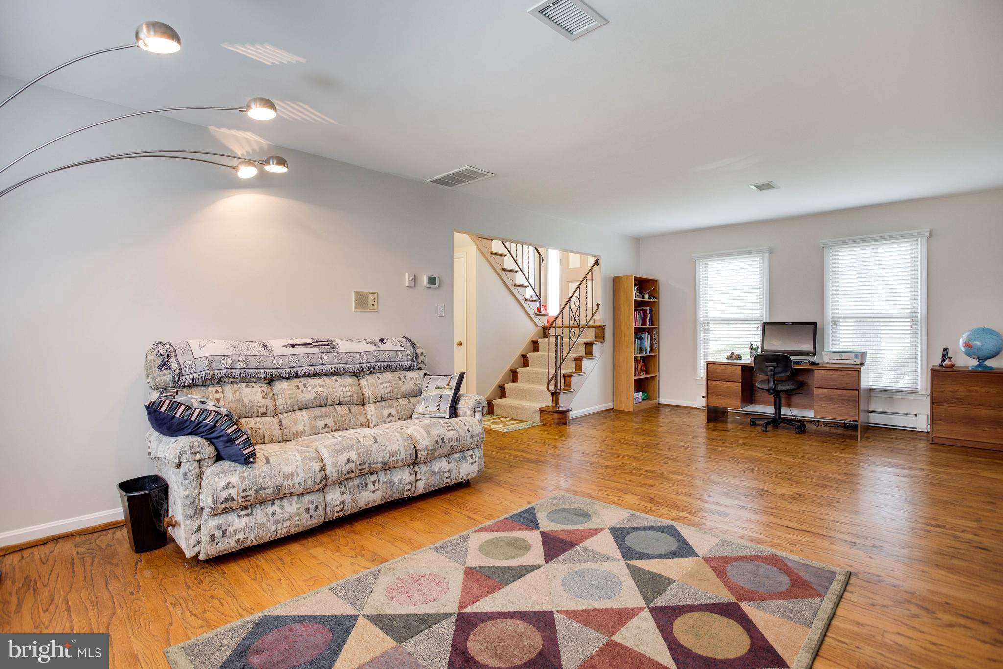 11633 Rivershore Drive Dunkirk, MD 20754 - Photo 19 of 29 a living room with furniture and a wooden floor