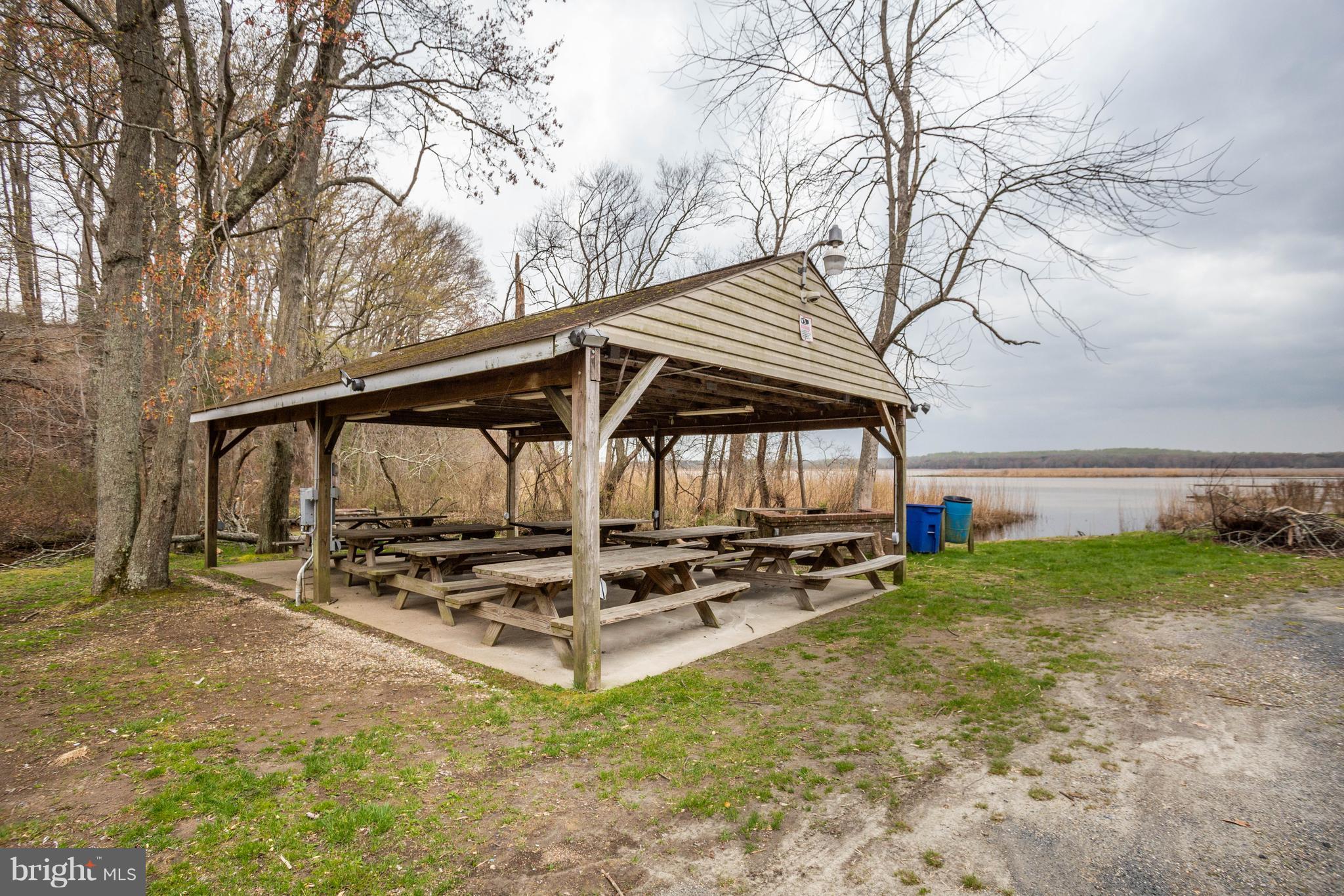 11633 Rivershore Drive Dunkirk, MD 20754 - Photo 7 of 29 a backyard of a house with table and chairs