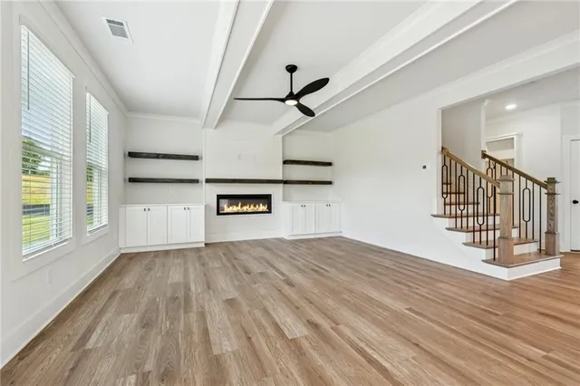 a view of a kitchen with a sink and a window