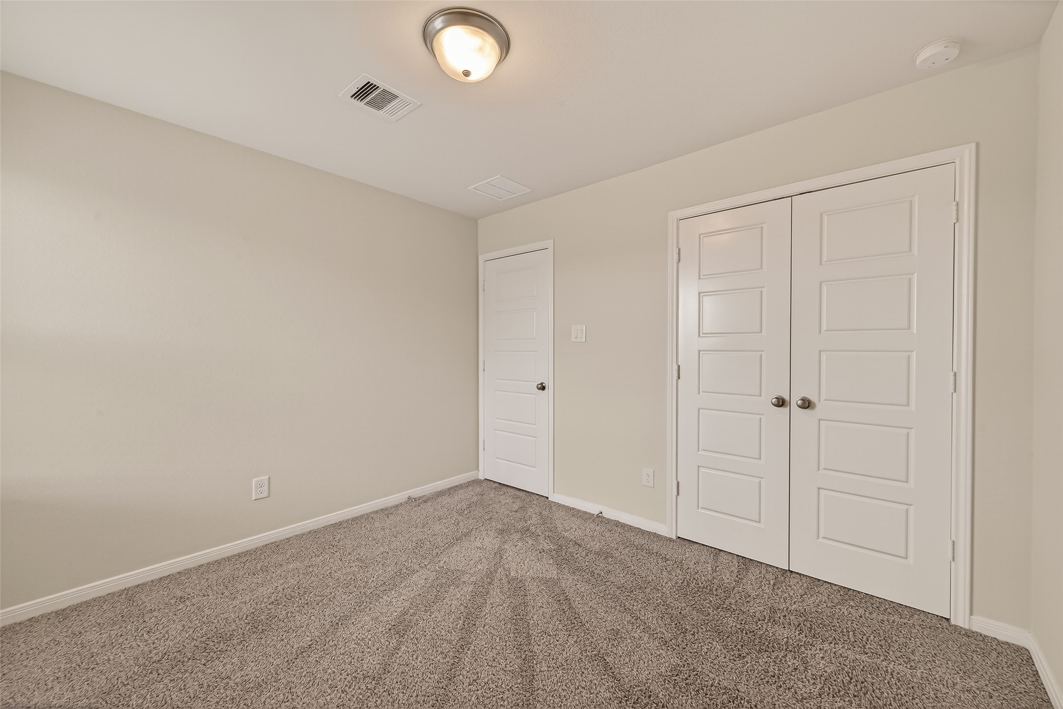 4231 Reese Ravine Lane Katy, TX 77493 - Photo 27 of 32 Another look at the second upstairs bedrooms with double door closet