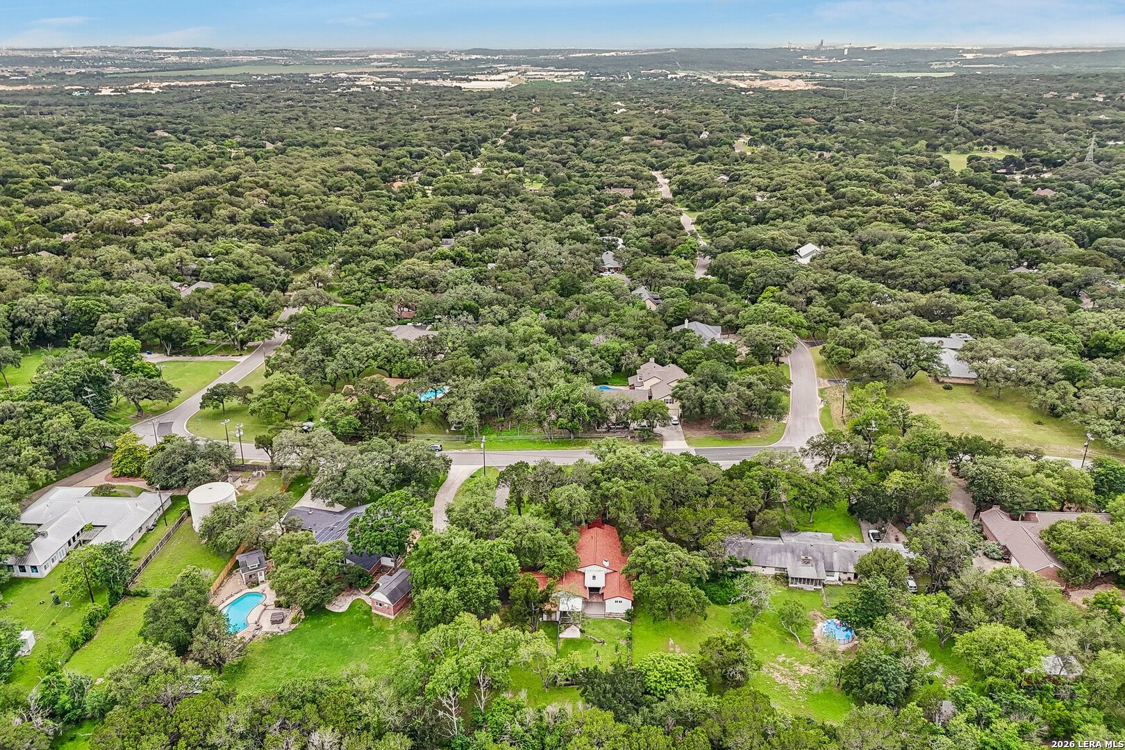 20632 Timber Rose Drive Garden Ridge, TX 78266 - Photo 46 of 46 an aerial view of residential houses with outdoor space and trees