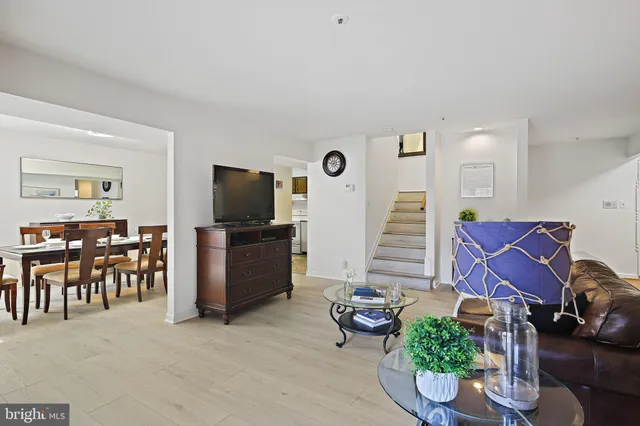 a view of front door with wooden floor
