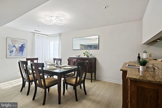 a kitchen with a stove and cabinets