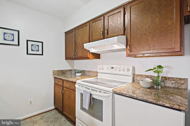 a bedroom with a bed and a mirror