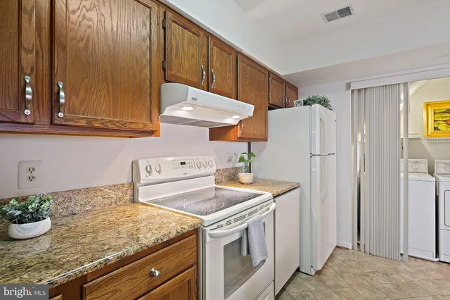 a bedroom with a bed and a mirror