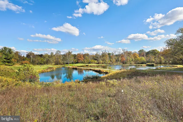 a view of a field with an outdoor space