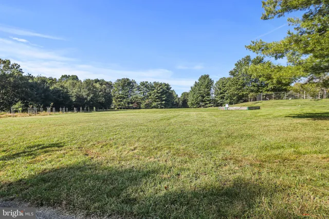 a view of swimming pool from a bench
