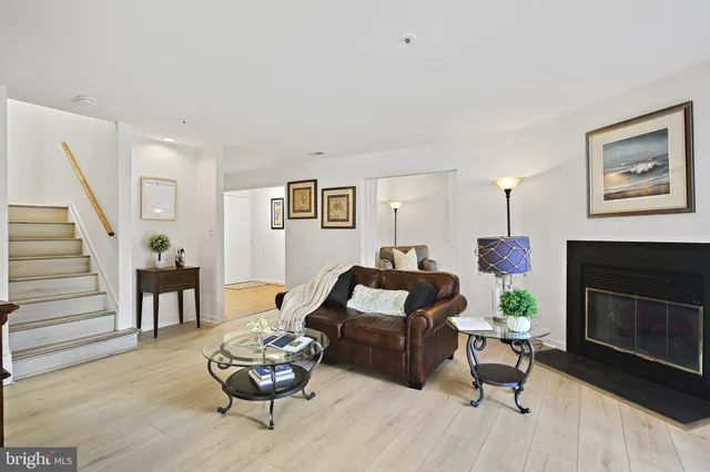 a bedroom with a bed and a chair