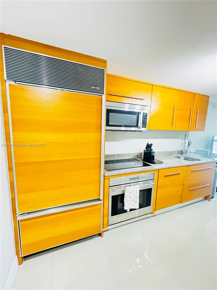 475 Brickell Avenue, Unit 808 Miami, FL 33131 - Photo 3 of 19 view of an empty room with a sink and a window