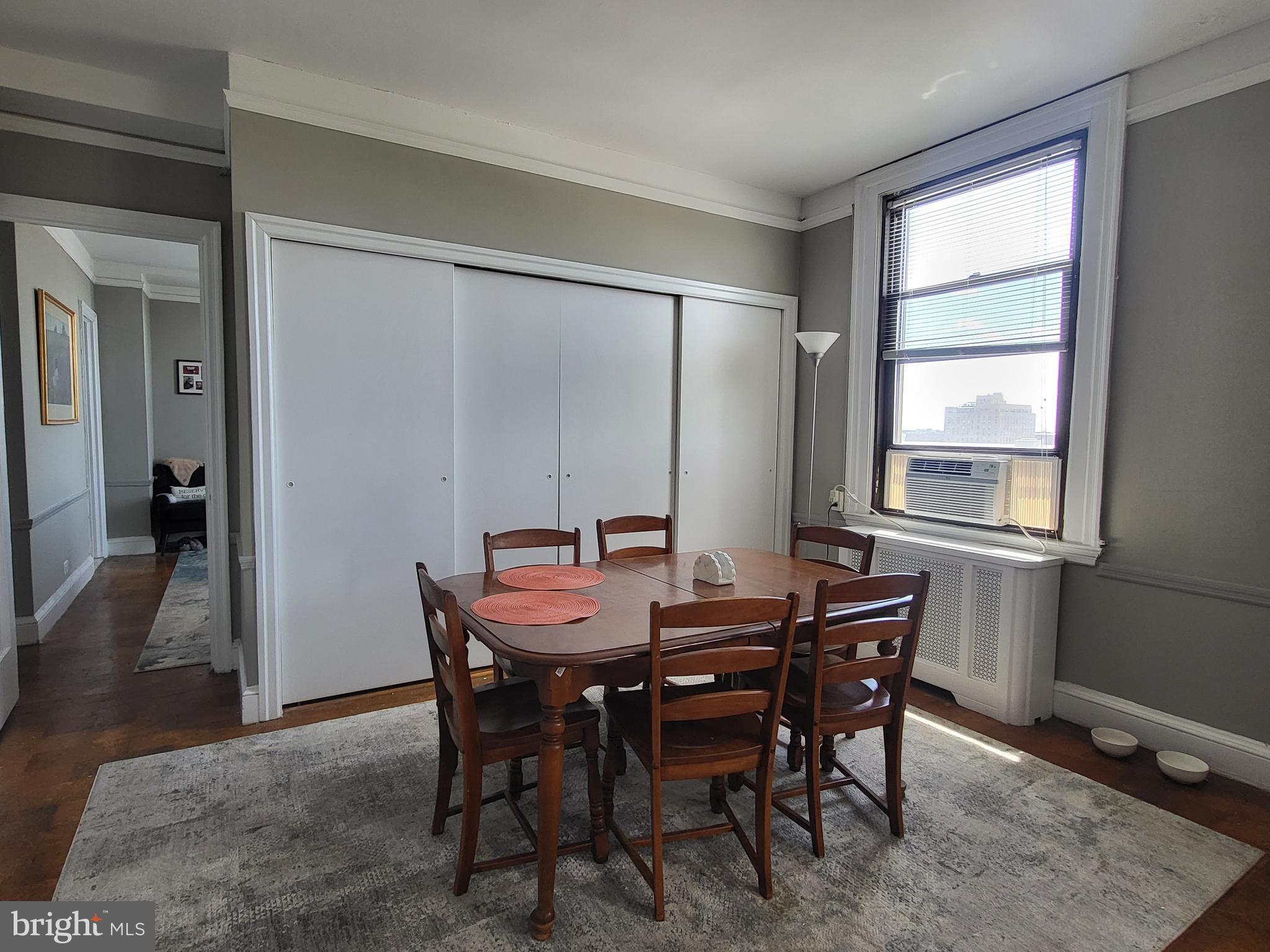 2031 Locust Street, Unit 801 Philadelphia, PA 19103 - Photo 3 of 23 a view of a dining room with furniture and window