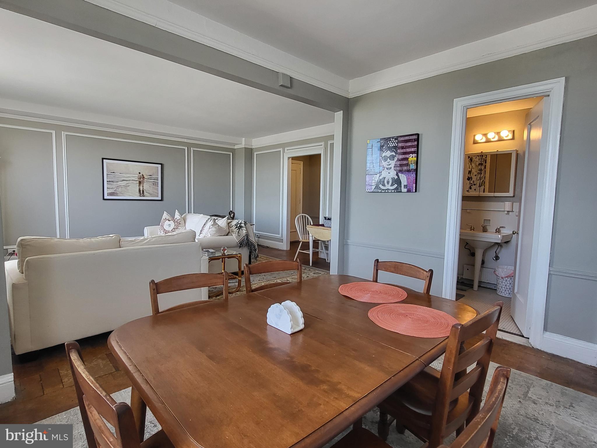 2031 Locust Street, Unit 801 Philadelphia, PA 19103 - Photo 4 of 23 a view of a dining room with furniture