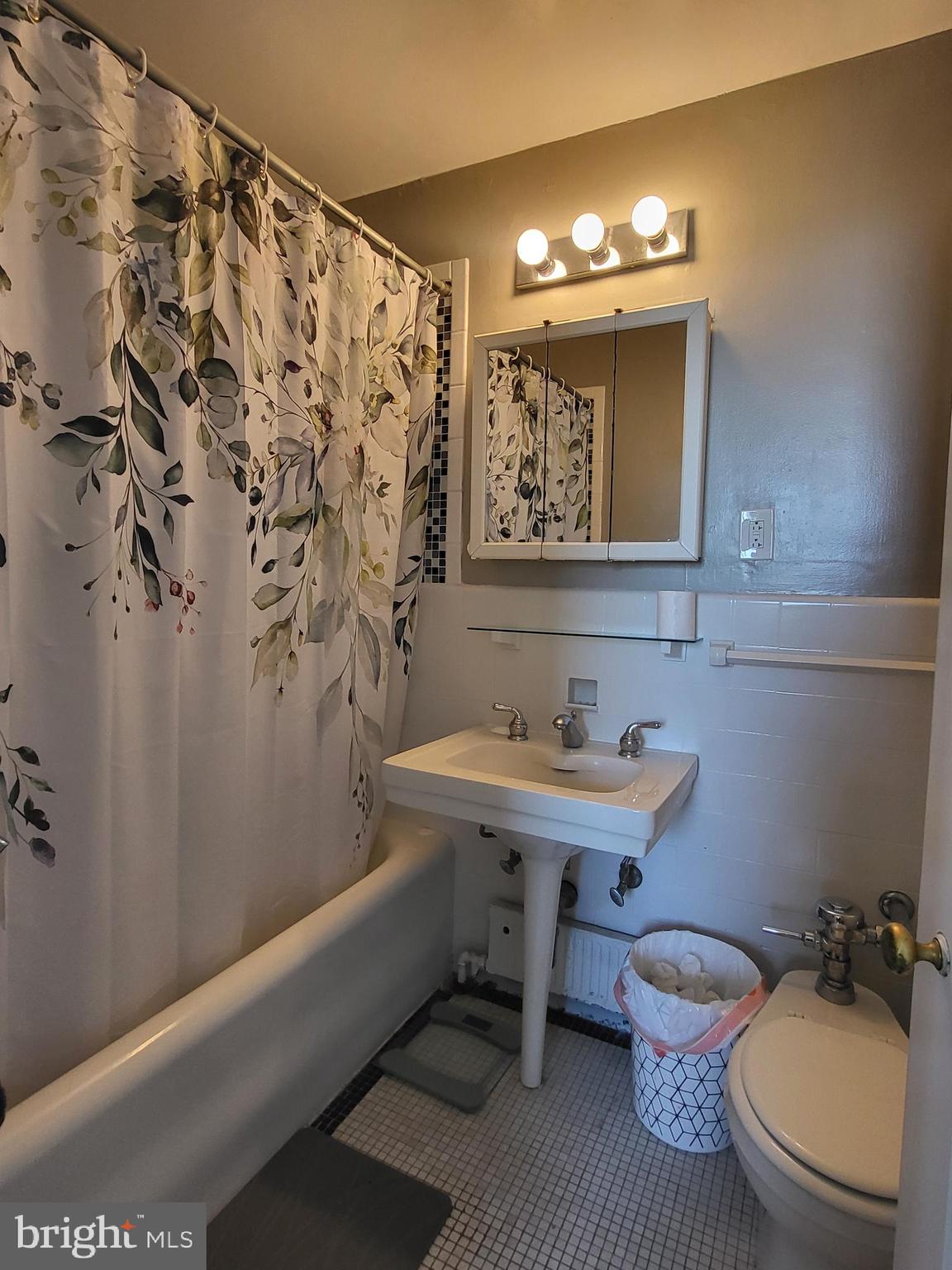 2031 Locust Street, Unit 801 Philadelphia, PA 19103 - Photo 6 of 23 a bathroom with a sink toilet and shower