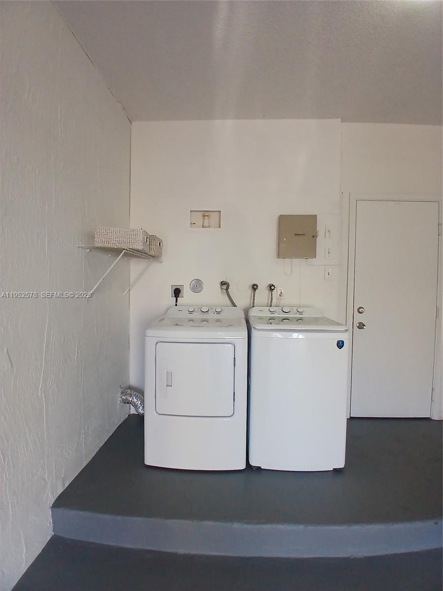 3618 San Simeon Circle, Unit 3618 Weston, FL 33331 - Photo 30 of 44 a utility room with washer and dryer