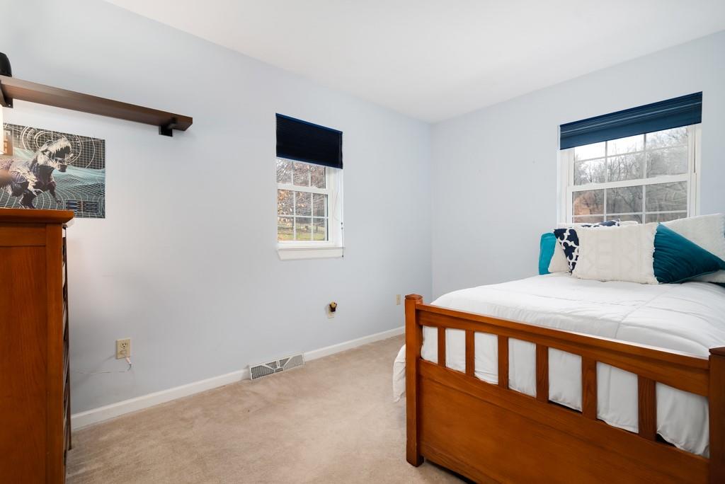 116 West Cruikshank Road Butler, PA 16002 - Photo 14 of 25 a bedroom with a bed and a window