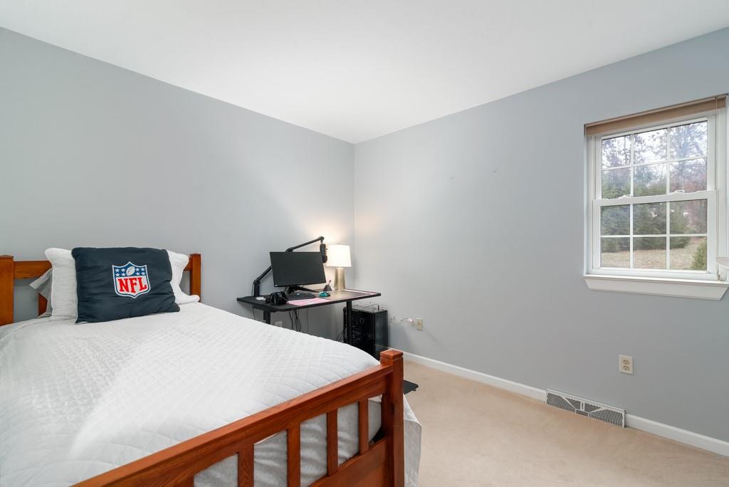 116 West Cruikshank Road Butler, PA 16002 - Photo 15 of 25 a bedroom with a bed and a tv